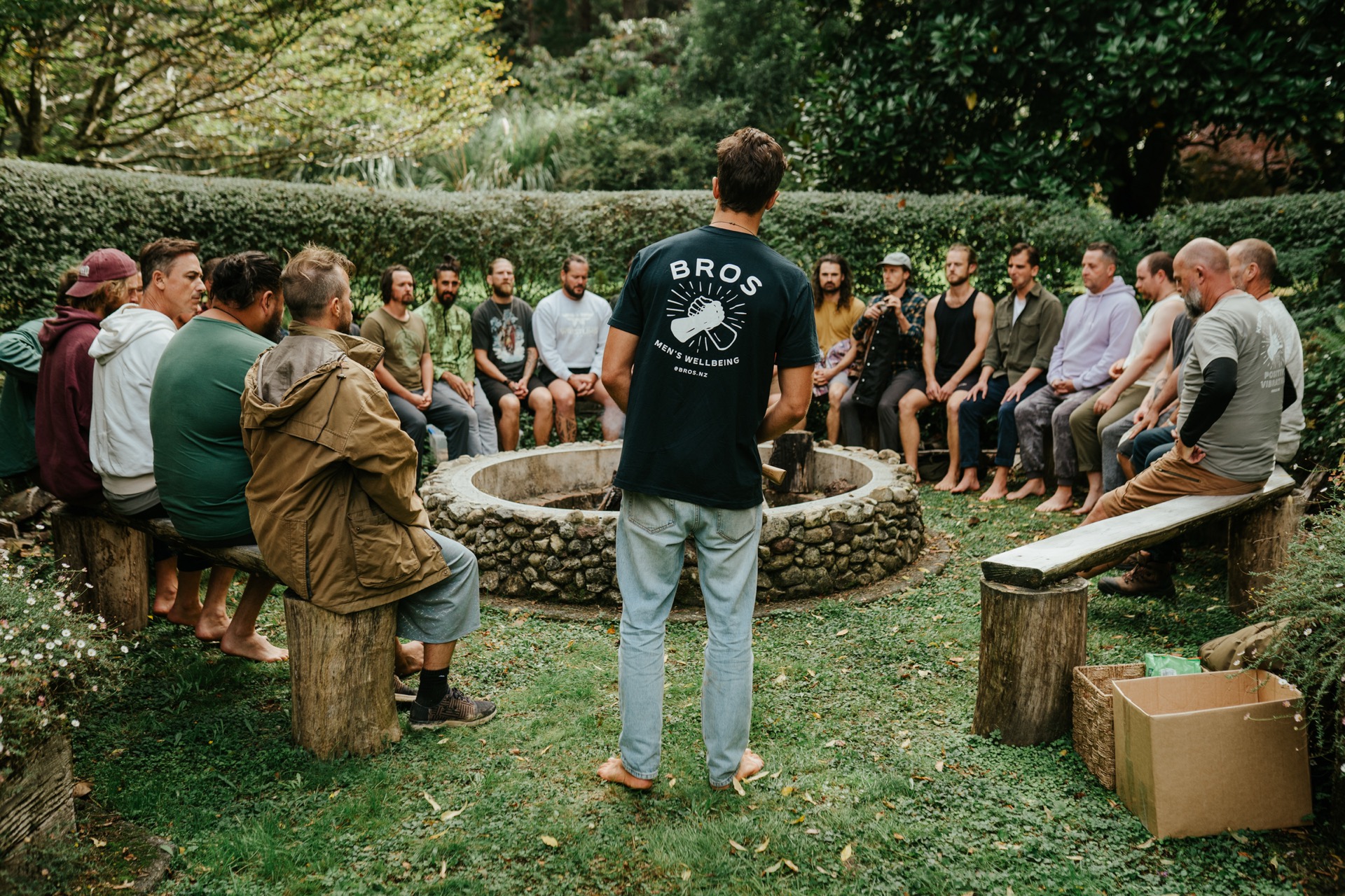 BROS men's circle around a stone fire pit